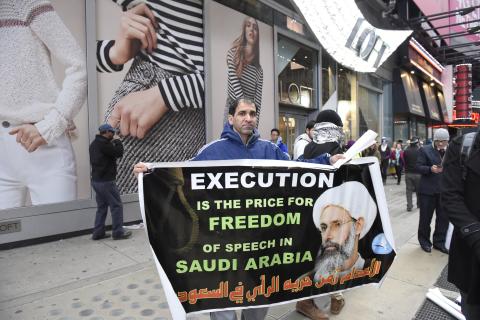 NEW YORK CITY - JANUARY 17 2016: Hundreds gathered in Times Square to protest the Saudi government’s execution of dissident sheikh Nimr Baqir al-Nimr and demand the release of Sheikh Ibrahim Zakzaky. © a katz, licensed under Shutterstock.