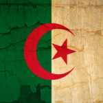 Flag of Algeria, grunge and scratched film dark effect